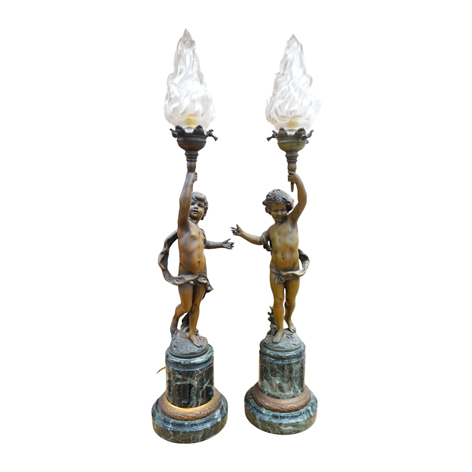 A pair of bronzed spelter ‘putto’ lamps, serpentine marble bases, 60cm. Condition - fair to good, not tested